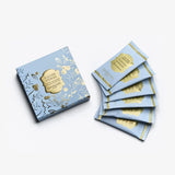 Coffret Flocon d’Épices Dammann Frères avec 6 sachets de thé.