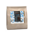 Sachet de fèves de chocolat noir Valrhona Caraïbe 66% pour pâtisserie, format 1 kg, présenté sur fond clair.